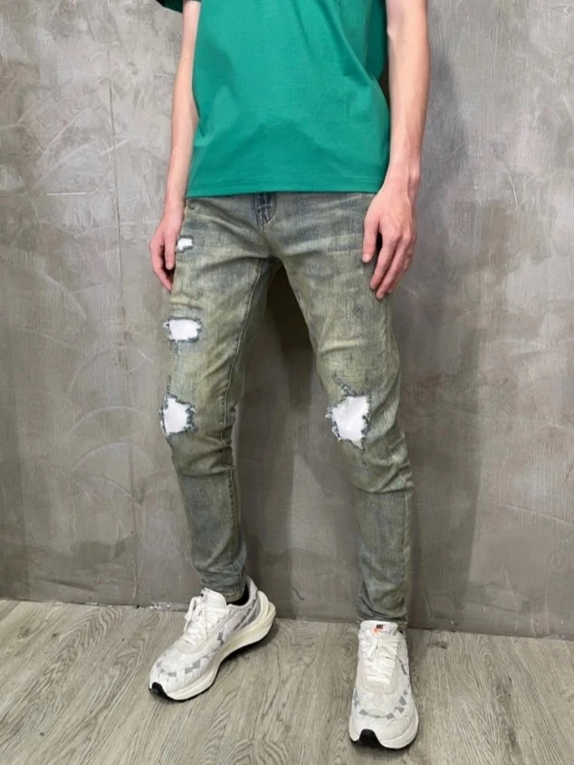 亂線綠蟒白補釘牛仔褲