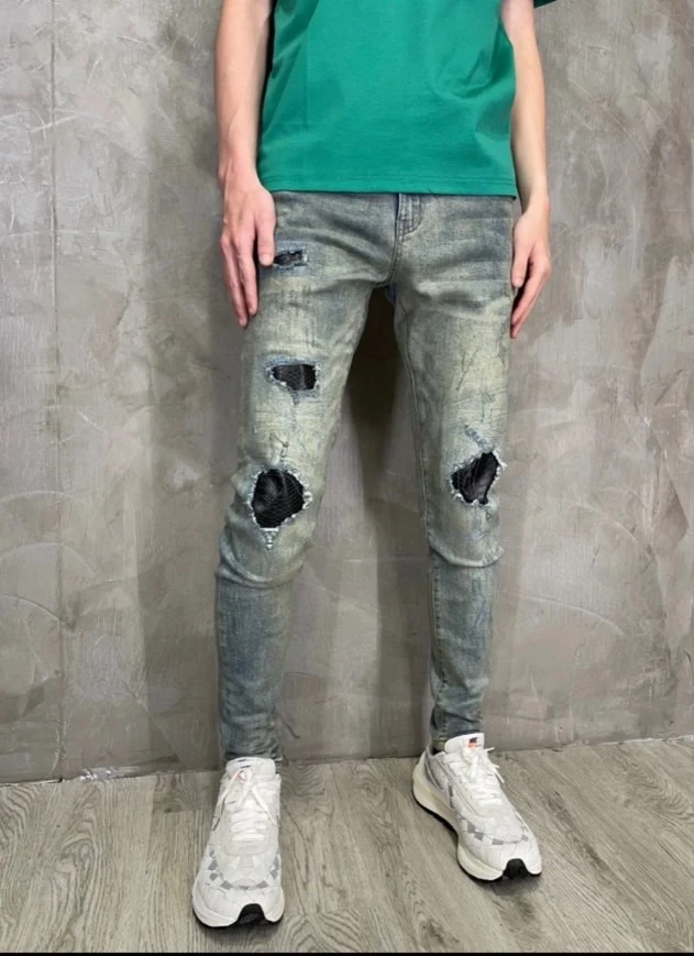 亂線綠蟒黑補釘牛仔褲