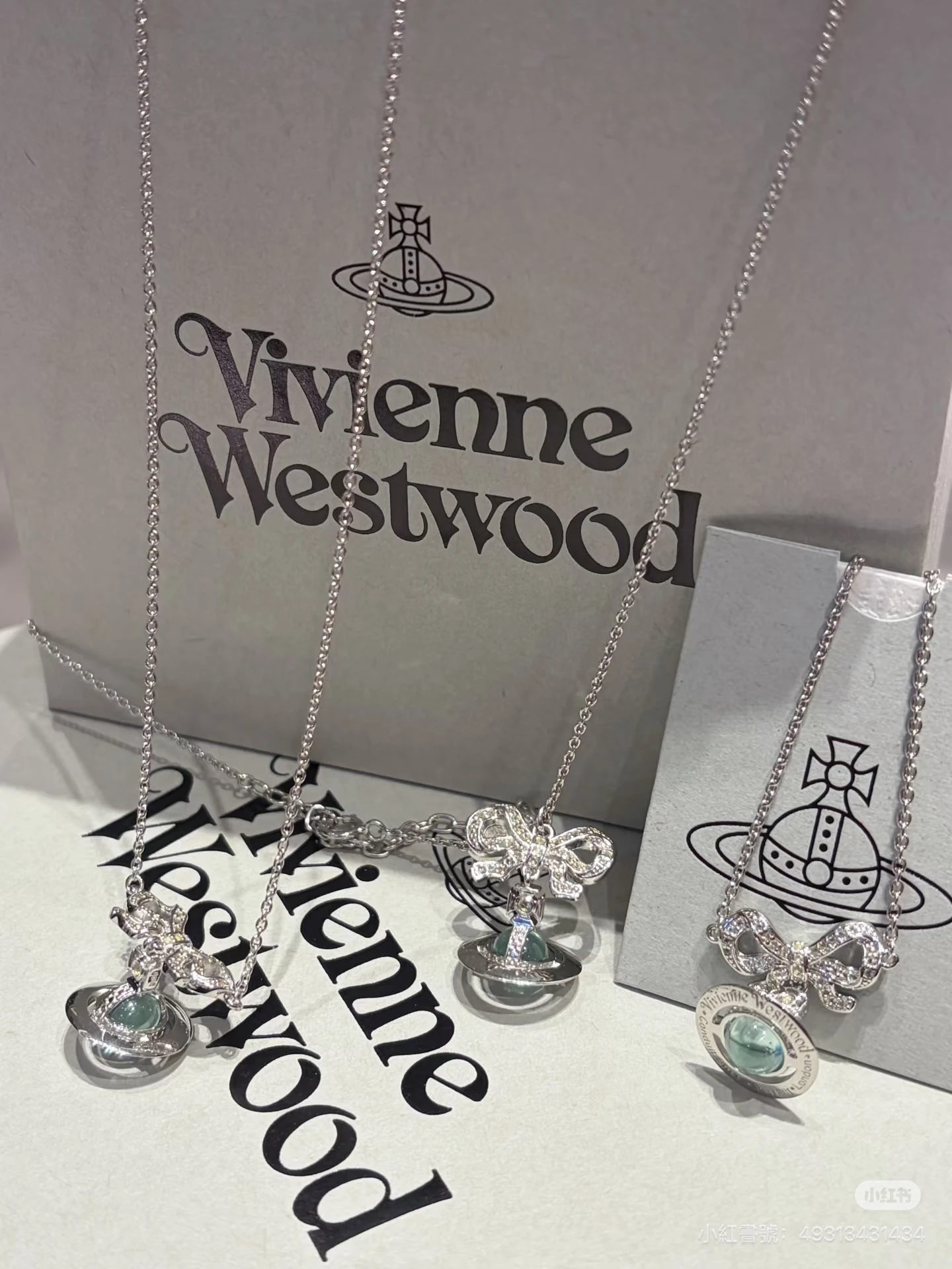 VIVIENNE WESTWOOD*現貨*925銀蝴蝶結透明球手鍊(複製)