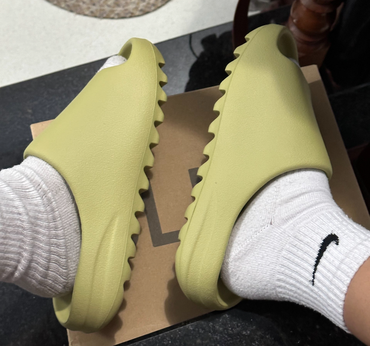 resin yeezy slides on feet