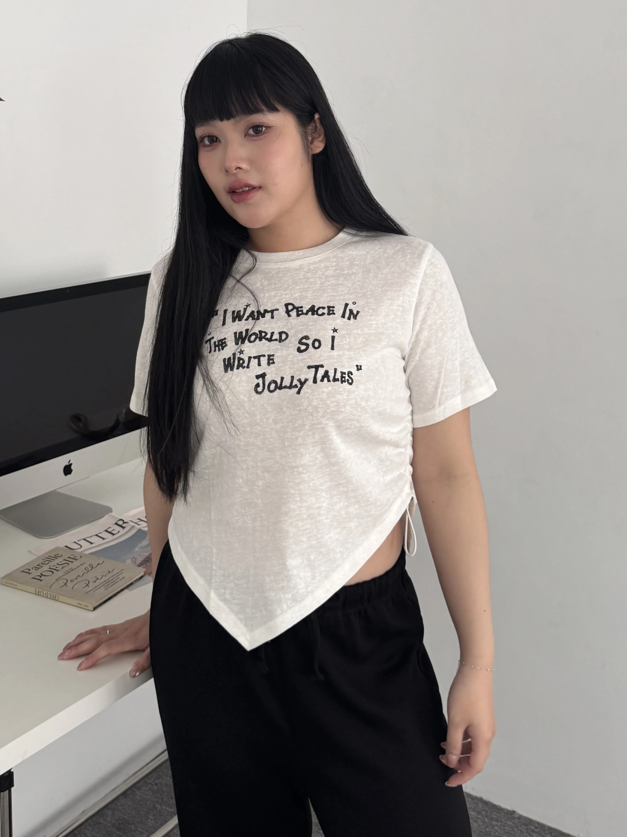 𝘔𝘪𝘴𝘴.𝘉𝘦𝘭𝘭𝘢.下擺不規則英文字短踢1770