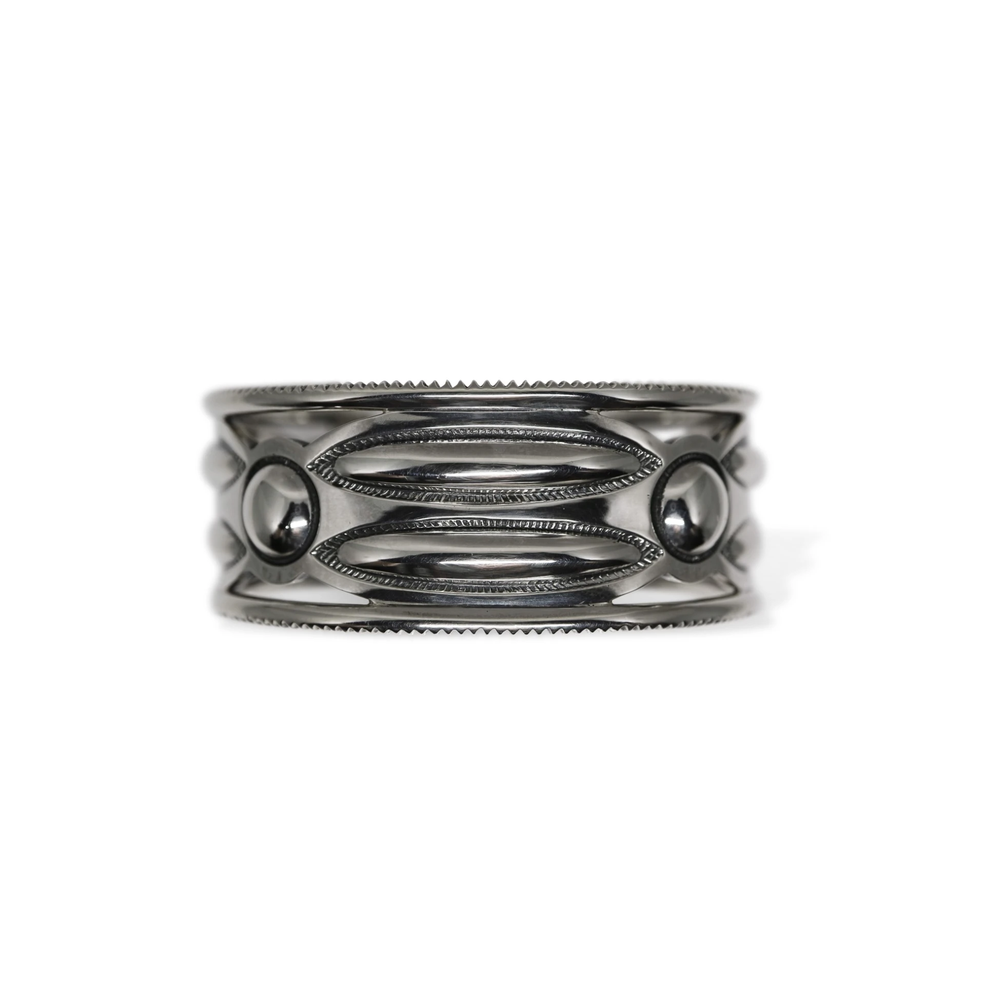 CUT OUT LONG OVAL W / MOONS COIN EDGE CUFF