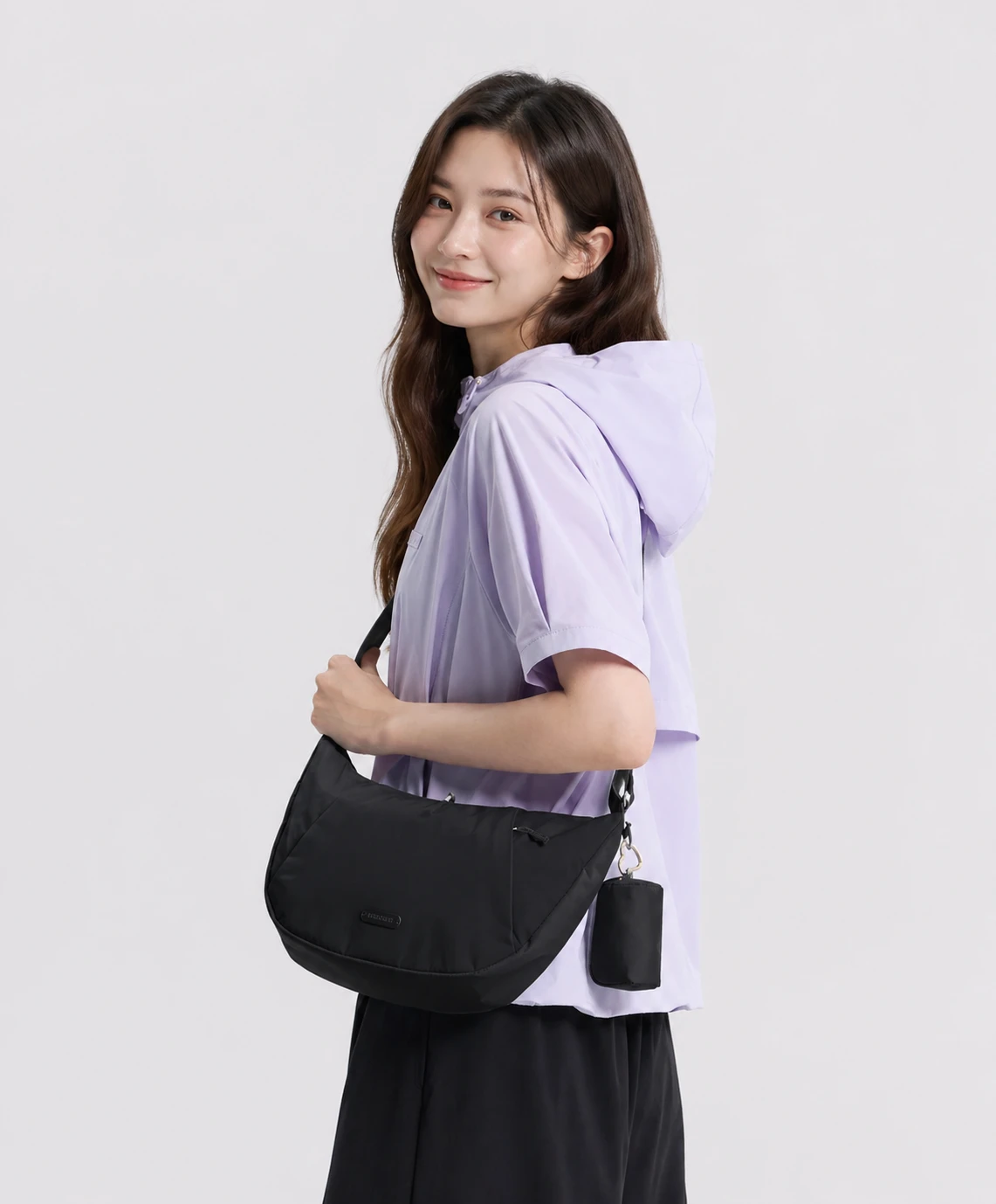 國家地理 LUMI 半月斜背包 附贈小包