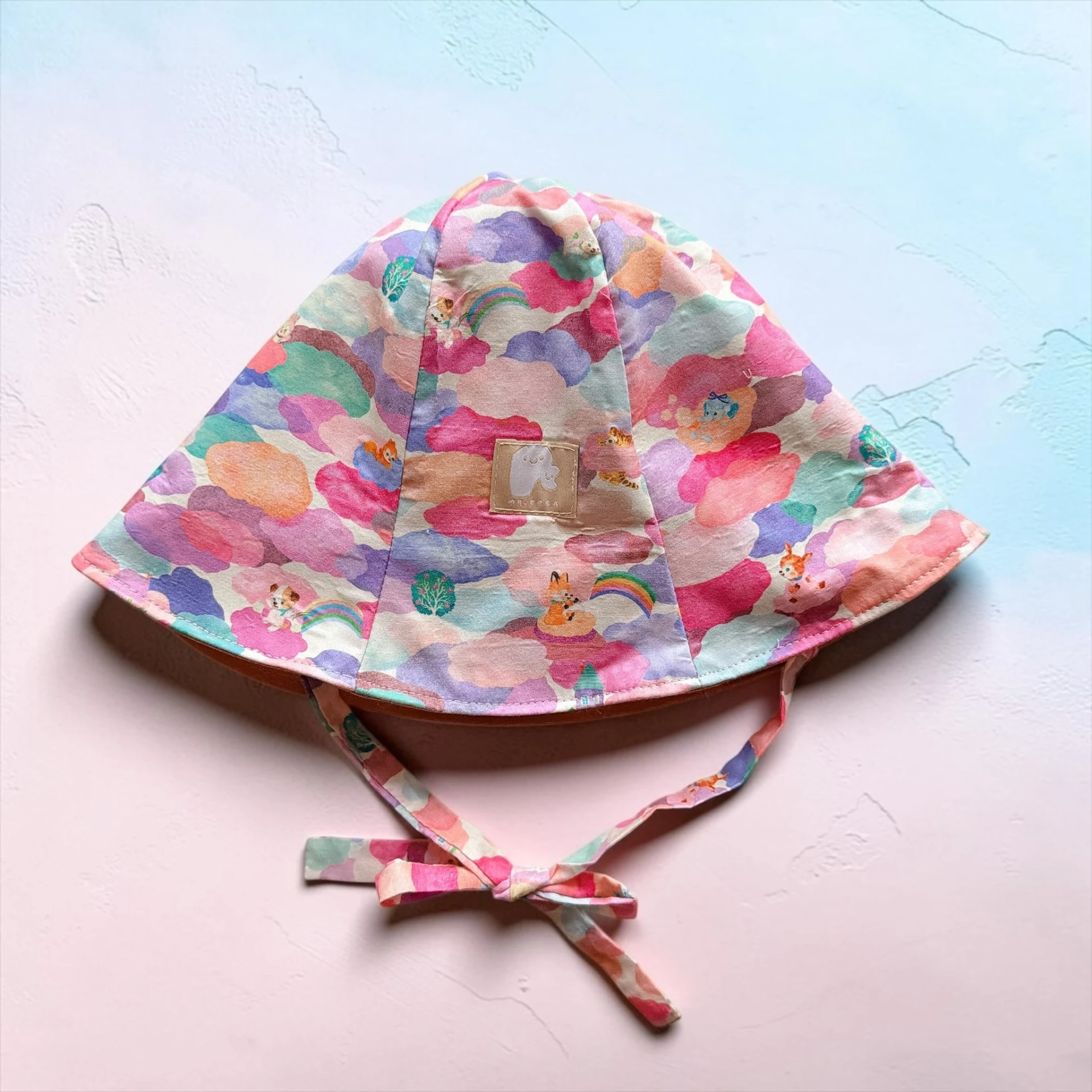 軟綿綿雲朵-綁帶花瓣帽/50cm