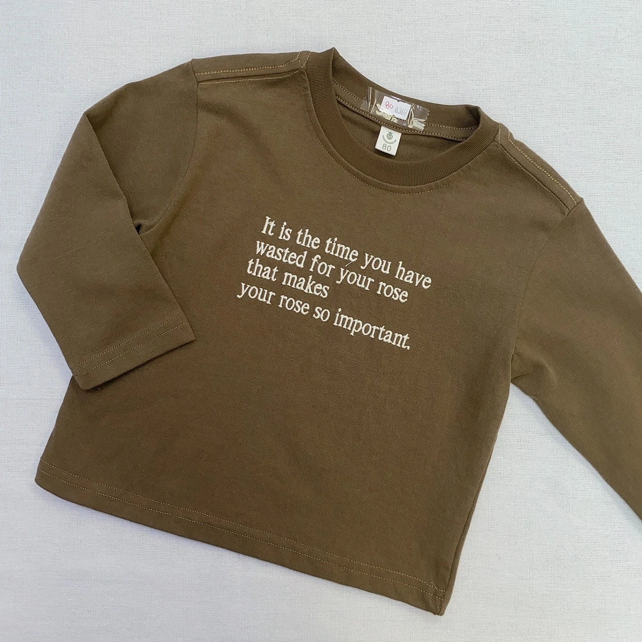 GZX-6369咖刺繡英文上衣