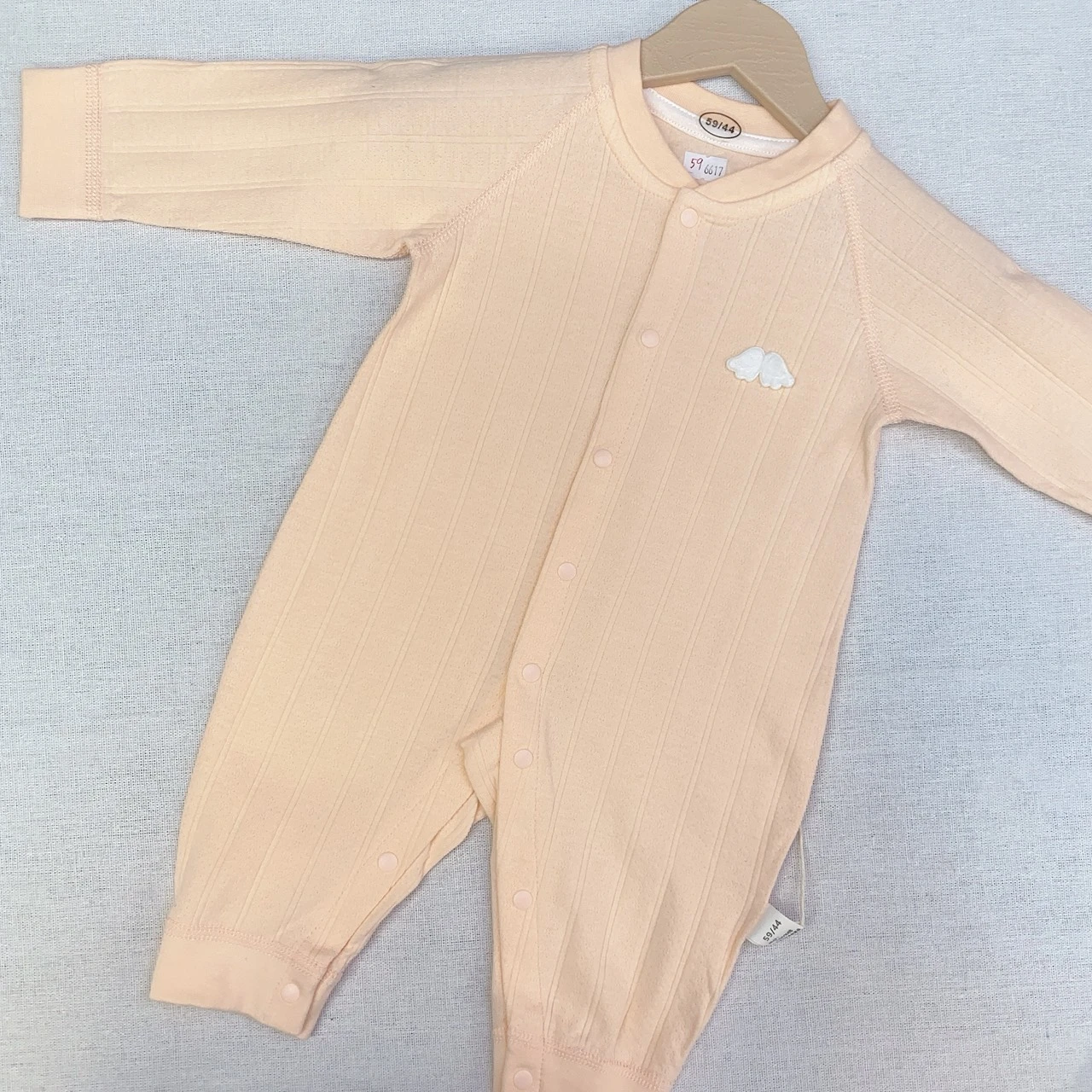G-6617橘透氣天使翅膀開扣爬服