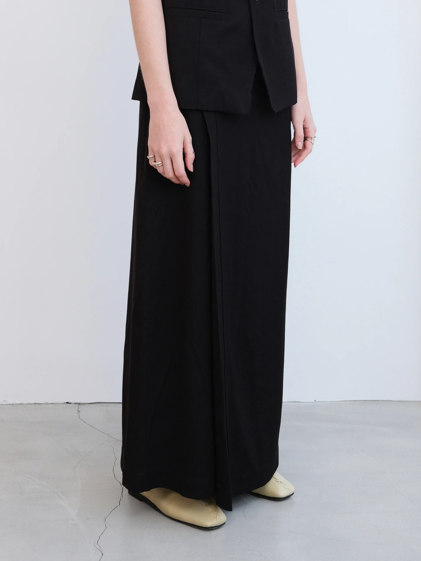 LoamBud Asymmetric Pleated Skirt in black