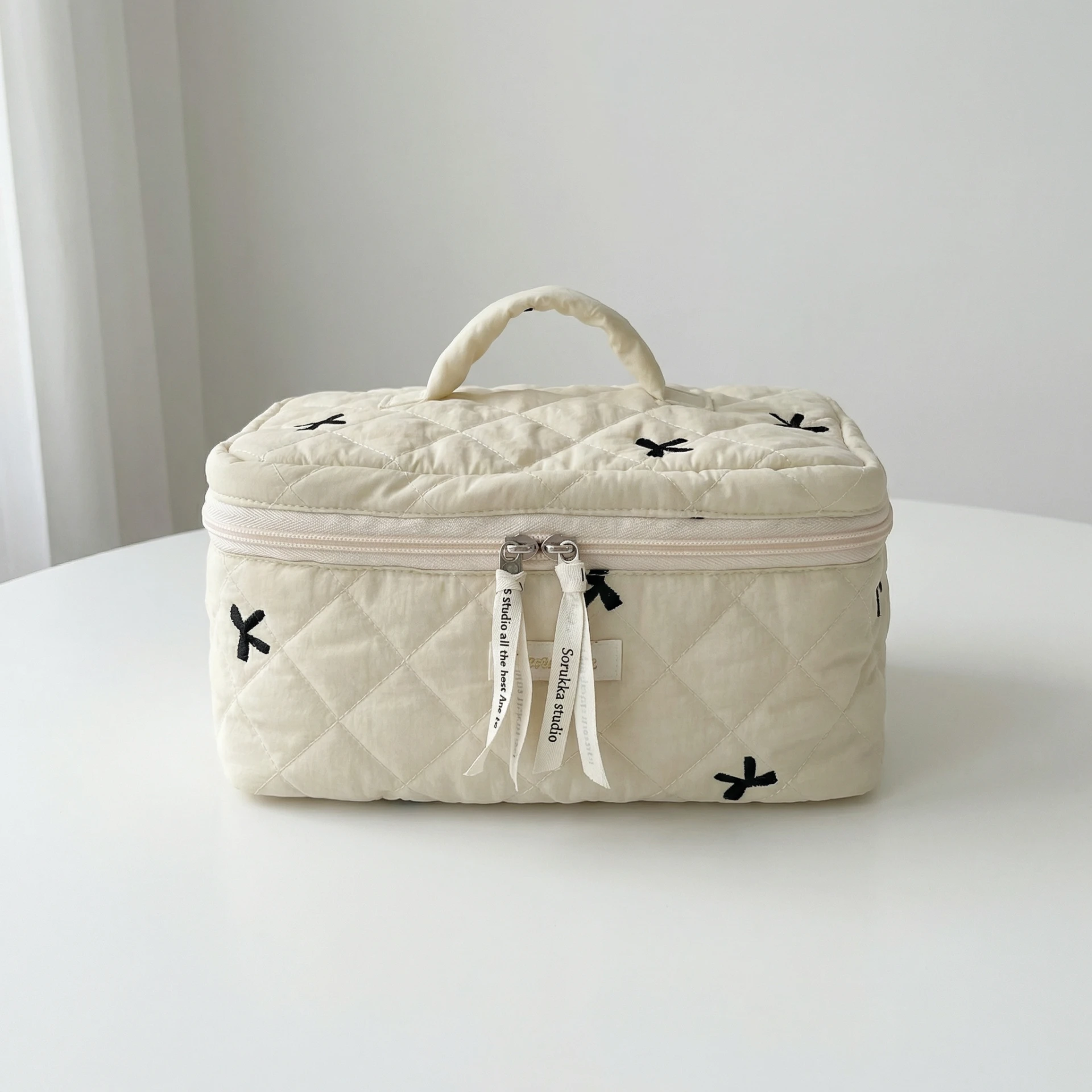 棉格蝴蝶結刺繡收納包
