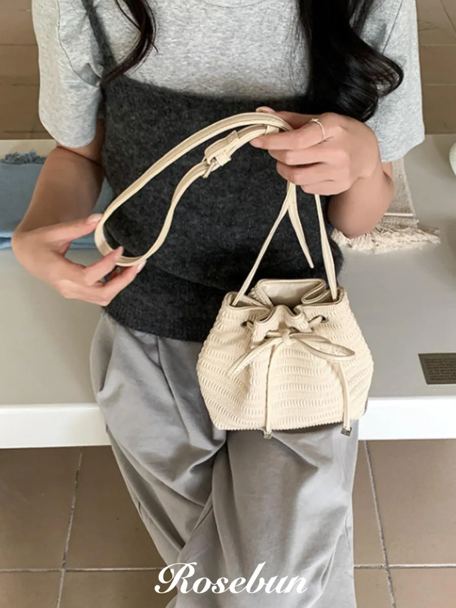 「絕版」蝴蝶結編織束口斜背包