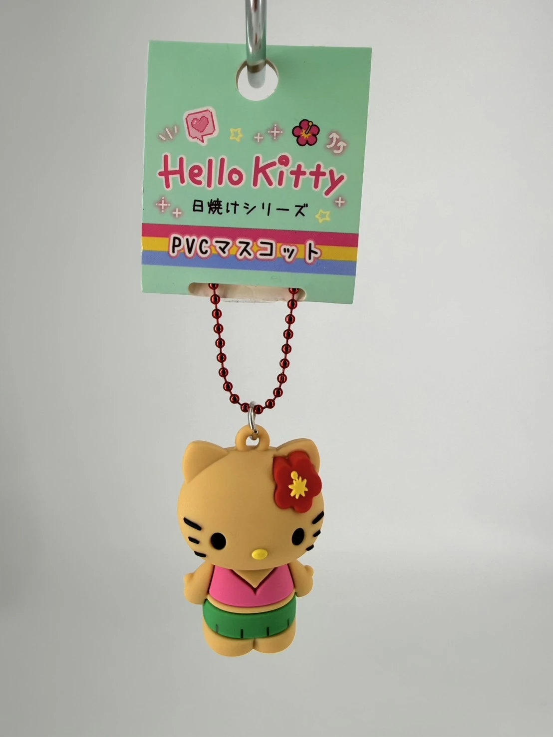 日曬黑皮KITTY扶桑花公仔吊飾