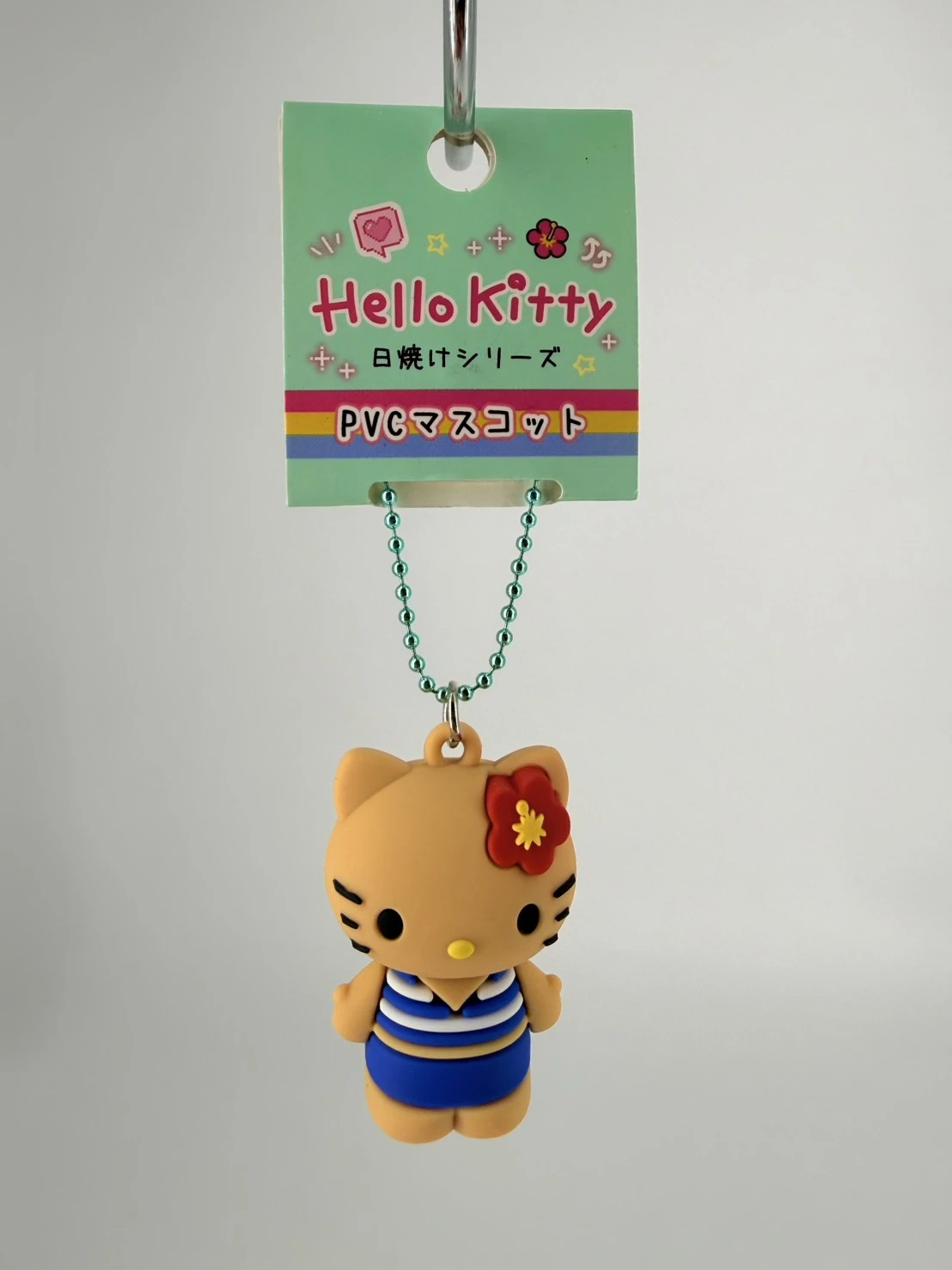 日曬黑皮KITTY扶桑花公仔吊飾