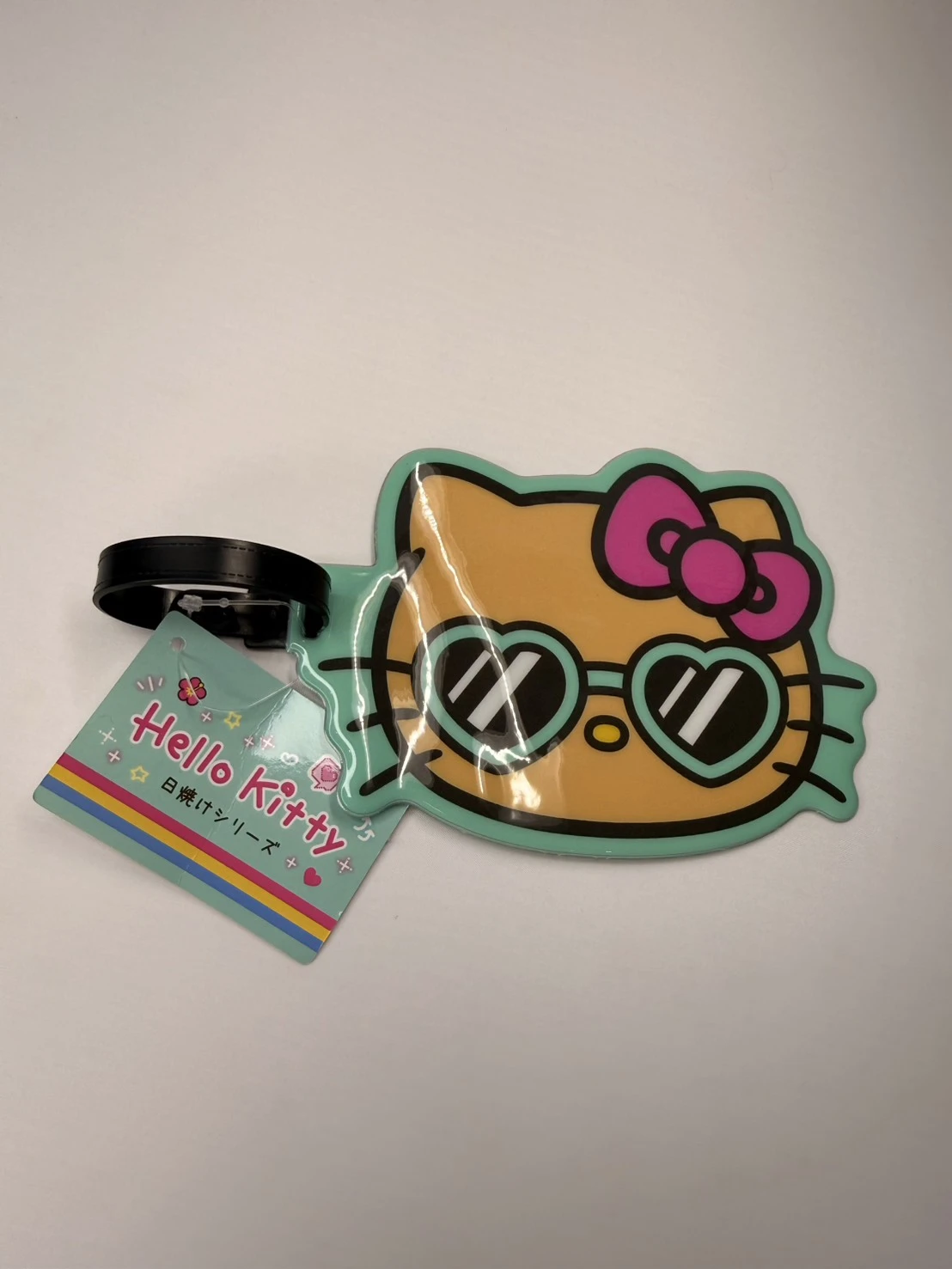 日曬黑皮KITTY愛心眼鏡行李吊牌