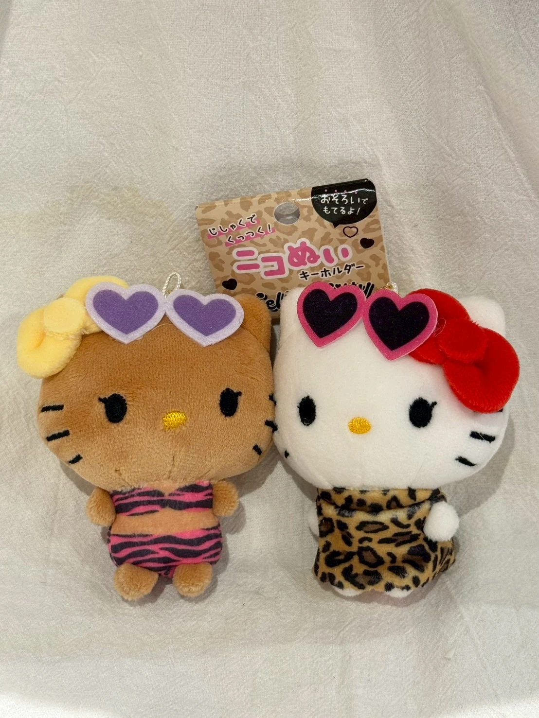 豹紋斑馬紋黑皮白kitty雙入吊飾(眼鏡)