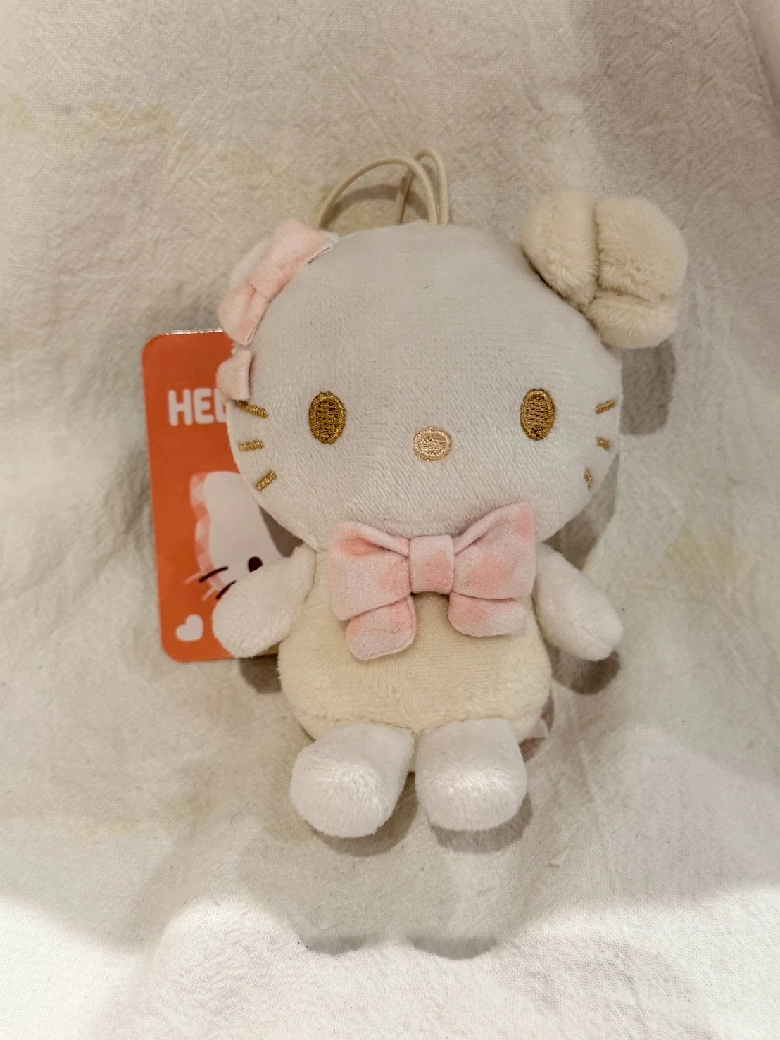 KITTY迷你蝴蝶結雪白吊飾
