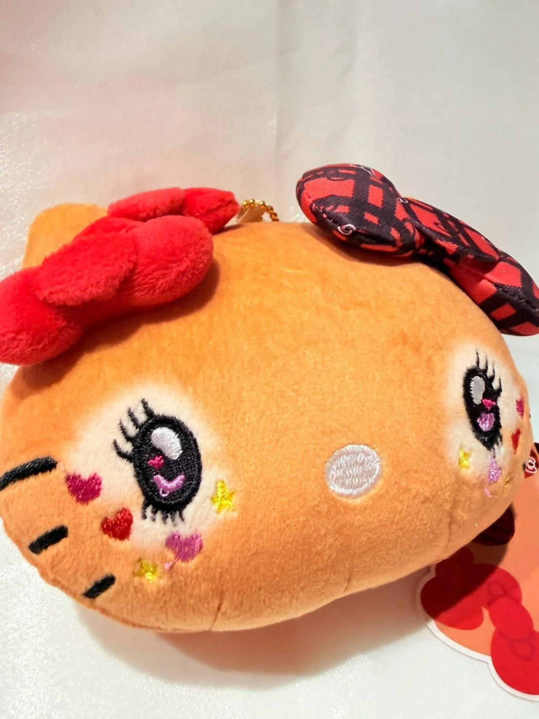 KITTY辣妹黑皮大臉蝴蝶結零錢包吊飾