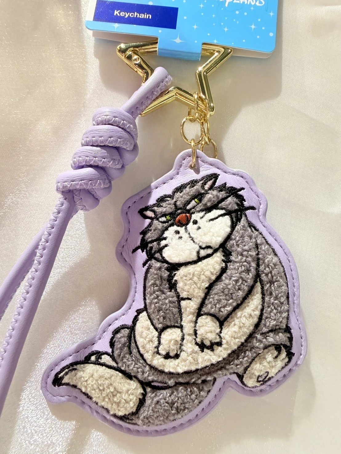 香港樂園魯斯佛刺繡皮繩鑰匙圈
