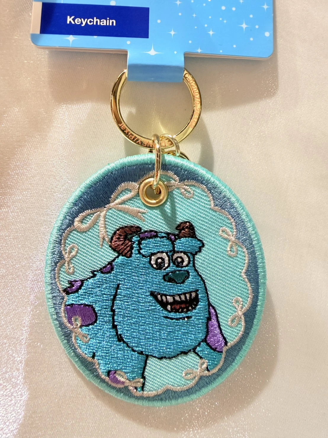 香港樂園毛怪刺繡布片鑰匙圈